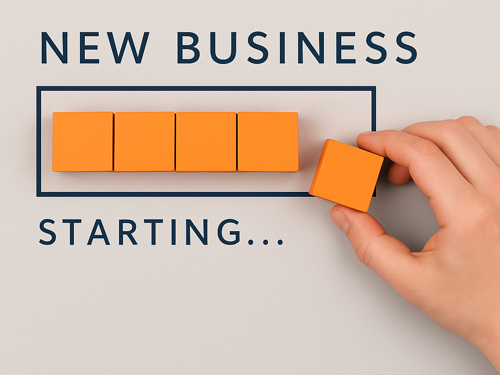 New business in tekst met oranje blokjes eronder